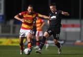 Gary Oliver (right) scored clincher against Partick (Pic by Craig Foy/SNS)