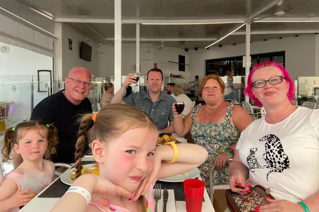 The Young family enjoy the sun and fun in Menorca after they managed to get daughter Ivy's passport the day before they were due to fly out