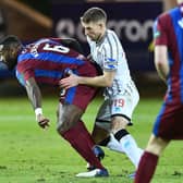 Stenhousemuir midfielder Nat Wedderburn fends off the attention of Pars ace David Wotherspoon during Saturday’s cup tie (Photo: Michael Gillen)