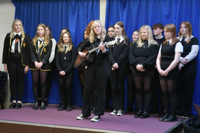 Grangemouth High School senior choir brought their own accompaniment for their great singing.
