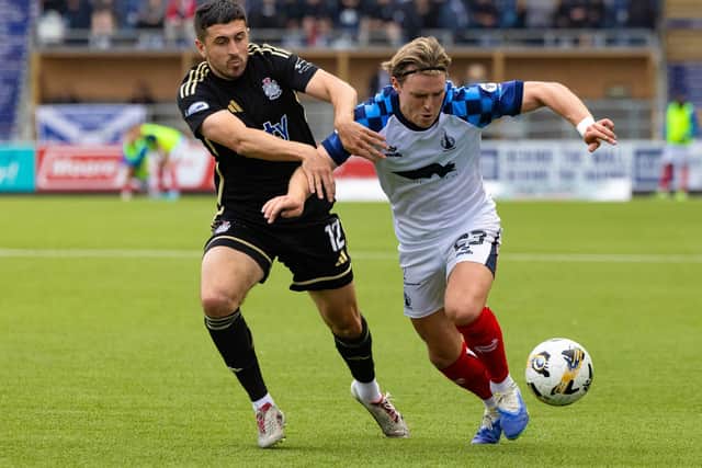 Falkirk goal-scorer Ethan Ross going up against Queen’s Park’s Carlo Pignatiello during his side’s 3-1 Premier Sports Cup group-stage win hosting the Glaswegians on Tuesday (Photo: Mark Scates/SNS Group)