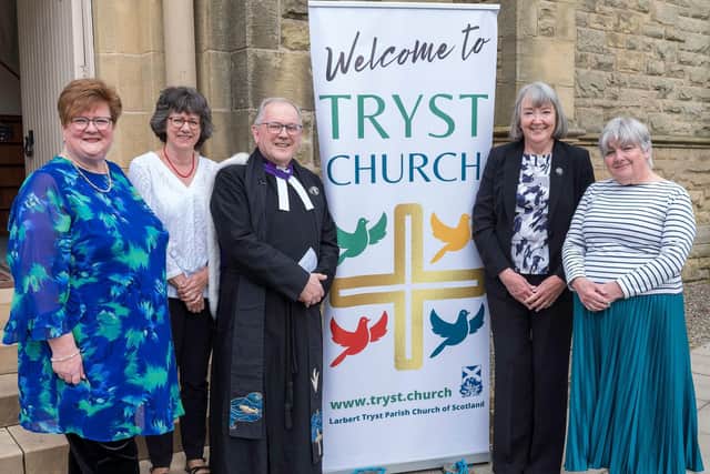 Rev Derek Gunn, Moderator of Forth Valley and Clydesdale Presbytery with the four Session Clerks.