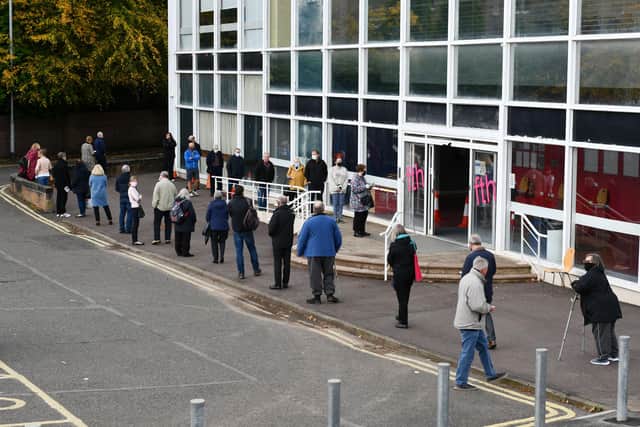 The flu vaccination queues built up outside Falkirk Town Hall after a delay involving the flu vaccine