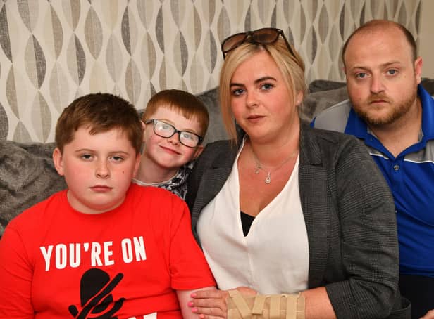 Natasha Rae with sons Ryley and Barry McGuckin, and partner Chris Bell - they had issues with Ryley's passport at Prestwich Airport when Ryanair refused to let them fly. Pic: Michael Gillen