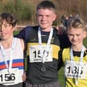 (From left), Howie Allison (Lasswade AC), Ray Taylor (FVH) and Harrison MacMillan (Central AC) with medals (Pic Kenneth Sutherland)