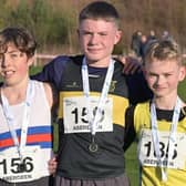 (From left), Howie Allison (Lasswade AC), Ray Taylor (FVH) and Harrison MacMillan (Central AC) with medals (Pic Kenneth Sutherland)
