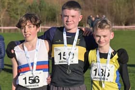 (From left), Howie Allison (Lasswade AC), Ray Taylor (FVH) and Harrison MacMillan (Central AC) with medals (Pic Kenneth Sutherland)