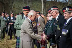 HM The King shakes hand with Argyll veteran Walter Stirling, watched by, left to right, Tony McVicar, Donald McCallum and Walter Logan.