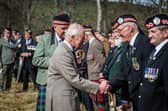HM The King shakes hand with Argyll veteran Walter Stirling, watched by, left to right, Tony McVicar, Donald McCallum and Walter Logan.