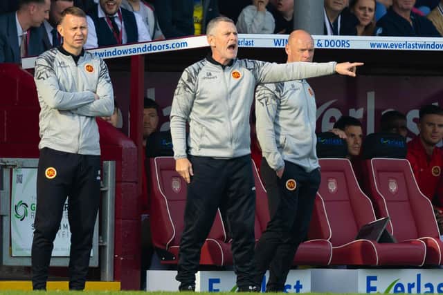 Stenhousemuir boss Gary Naysmith points on the touchline alongside his coaching team Myles Hogarth and Brown Ferguson during the 4-0 defeat (Photo by Ross Parker / SNS Group)