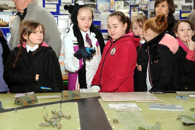 Pupils looking at Grangemouth Airfield display.