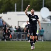 Brad McKay celebrates the 1-0 victory against Hibernian after the full-time whistle on Tuesday night (Photo: Michael Gillen)