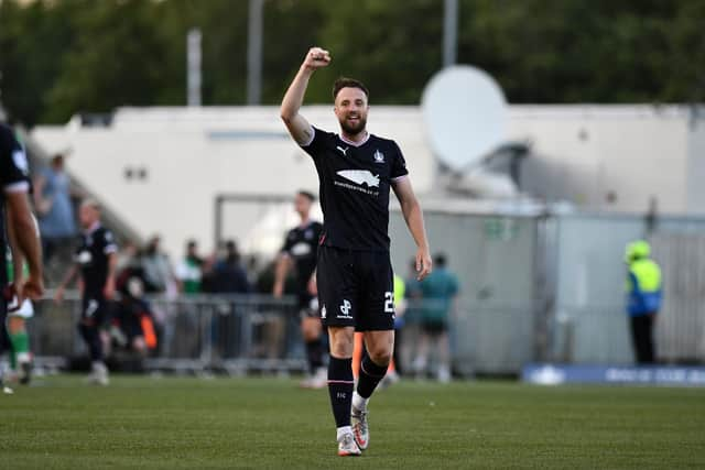 Brad McKay celebrates the 1-0 victory against Hibernian after the full-time whistle on Tuesday night (Photo: Michael Gillen)