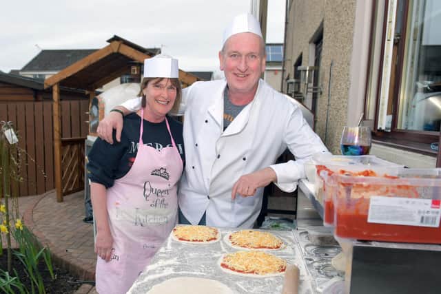Sandra and Casey Toner get busy at their oven for Banknock's big pizza bonanza