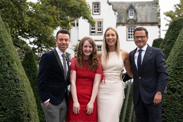 Denny woman Emma-May Millar (middle left) with Lunch with an Old Bag host Des Clarke, presenter Amy Irons and auctioneer Alex Fleming. Picture: David Cheskin.