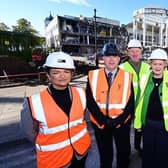 Council Leader Cecil Meiklejohn, centre, and Deputy Leader Paul Garner, back left, visit the demolition site with council officers and representatives from David Morton Ltd. Pic: Falkirk Council