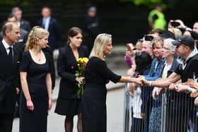Members of the Royal Family chat with well wishers outside Balmoral. On Sunday HM The Queen's coffin will leave the castle for Edinburgh. Pic: Michael Gillen