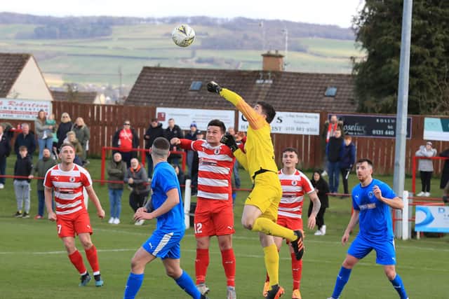 A Bo'ness corner kick is punched away by Rose 'keeper Hall
