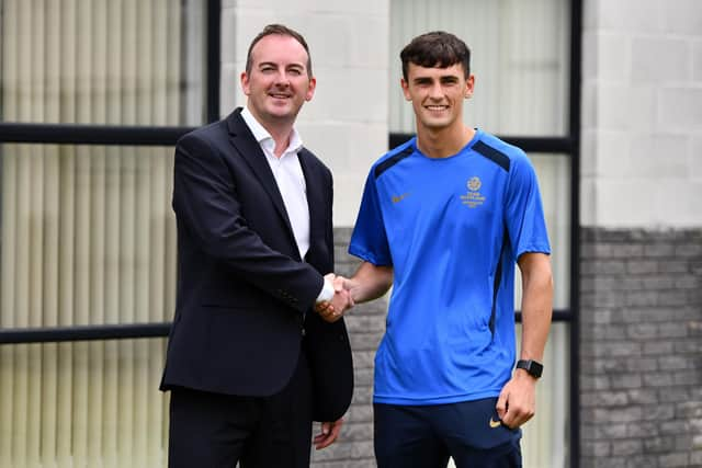 Reece Lynch pictured alongside managing director of Janex Limited, Daniel McElhinney - the Falkirk-based business are sponsoring the boxer