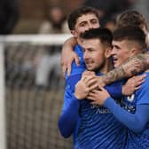 Bo’ness United ace Ryan Stevenson is mobbed by his team-mates after scoring his side’s third goal against Darvel on Saturday at Newtown Park (Pictures by Alan Murray)