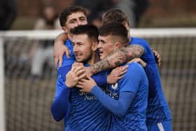 Bo’ness United ace Ryan Stevenson is mobbed by his team-mates after scoring his side’s third goal against Darvel on Saturday at Newtown Park (Pictures by Alan Murray)