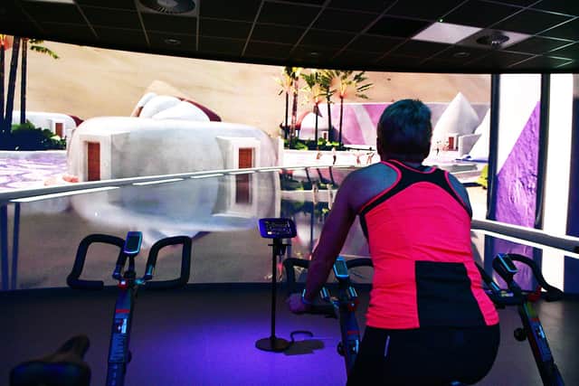 Health and fitness instructor Lynn McGuire tries out the new immersive cycle studio in Grangemouth Sports Complex
