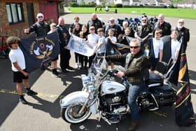 Widows Sons Scotland hand over a cheque for £300 to Dunipace Primary School pupils. Pic: Michael Gillen