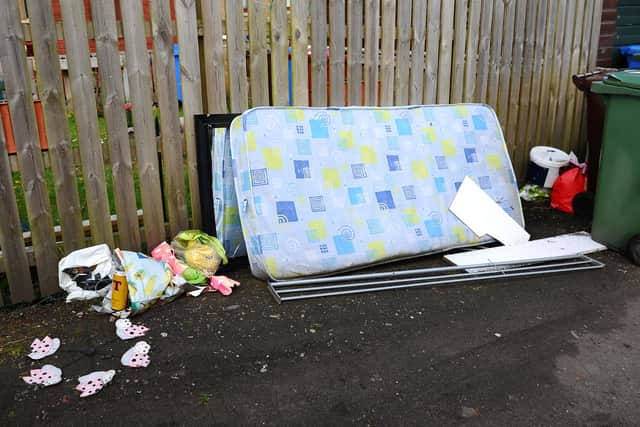 A mattress is left dumped at the side of the road (Pic: Michael Gillen)