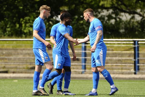 A common sight this season is Tiwi Daramola taking acclaim of team-mates after scoring (Pic Alan Murray)