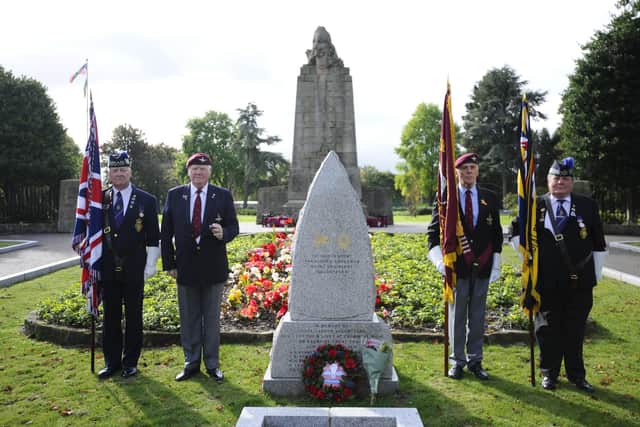 Paying respects at Sunday's memorial service in Grangemouth