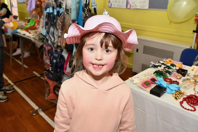Happy with her hat.