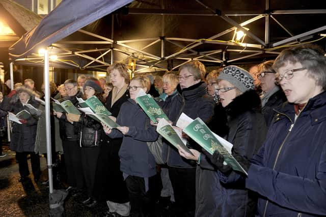 05-12-2017. Picture Michael Gillen. DENNY. Strathcarron Hospice. Annual "Light up a Life", candlelight celebration with lighting of Christmas tree. Strathcarron Singers.

Light Up A Life at Strathcarron is a celebration of the lives of much loved relatives and friends. Dedicate a Light on special Christmas Tree in honour or memory of someone who you wish to remember. A special tree will be lit in the grounds of the Hospice in Denny, each of the lights is sponsored to remember someone that is very special or missed.