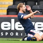 Sean Mackie slides as he celebrates scoring Falkirk’s second goal against Airdrieonians last weekend during a 2-0 league victory (Photo: Michael Gillen)