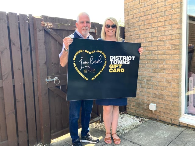 Charlie Allan and daughter Cheryl Hogarthwith the Falkirk District Towns Gift Card she nominated him to receive