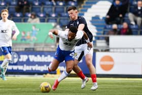 Craig McGuffie in action against Cove (Picture: Michael Gillen)