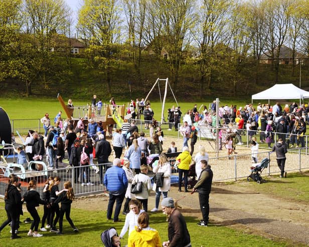 Crowds turn out to try out the new play park.