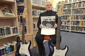 Falkirk councillor Billy Buchanan is selling signed Oasis guitars for a good cause  Pic: Contributed