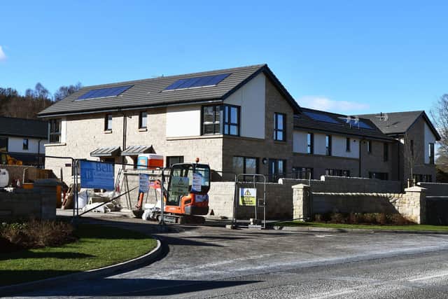 The 24 properties were due to be completed January 2022 but workmen are still on the site