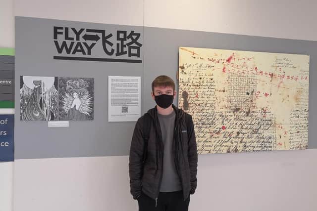 Connor Draycott, an art student from Larbert High School, who helped with the installation of the exhibition