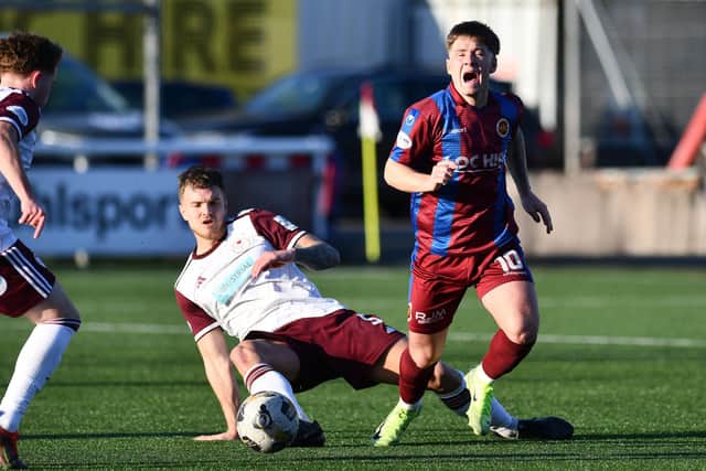 Kelty’s Callum Flatman fouls Stenhousemuir star Matty Yates during Saturday's 0-0 draw (Photo: Michael Gillen)