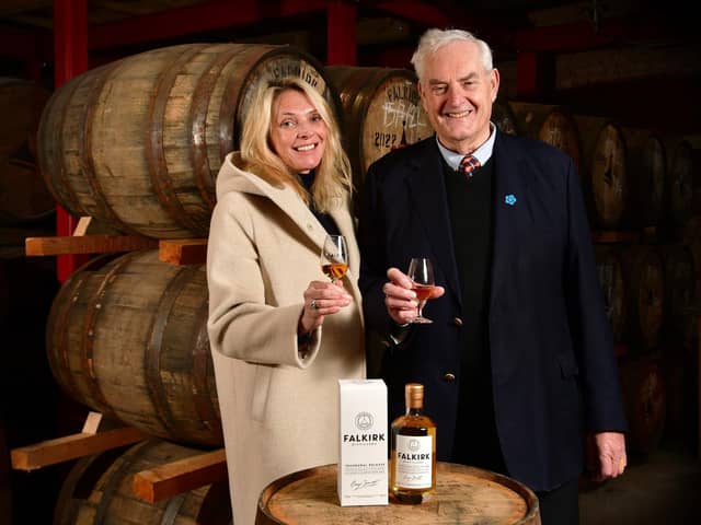 Fiona and George Stewart raise a glass to the first bottled release of Falkirk Distillery's whisky which sold out in little over 24 hours. Pic: Michael Gillen