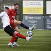 Brad McKay fends off Clyde's Kyle Doherty (Photo: Alan Murray)