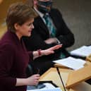 Scotland's First Minister Nicola Sturgeon during First Minster's Questions at the Scottish Parliament in Holyrood, Edinburgh. Picture date: Thursday February 3, 2022.