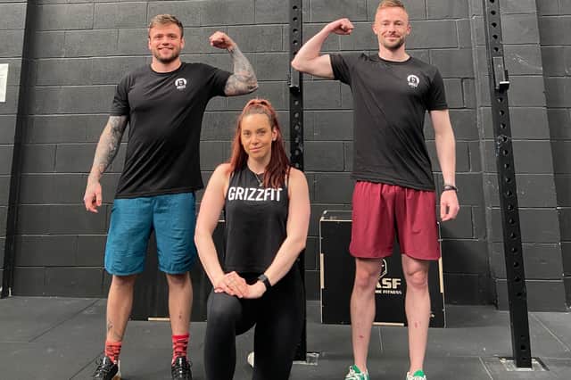 Fundraisers Barry McGeachie, Tom Griscti, Jen Matthews at the GrizzFit Gym in Linlithgow.