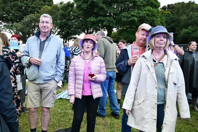 This year's must have attire was hats and raincoats rather than sunglasses and suntan lotion - but it didn't affect enjoyment of the music.
