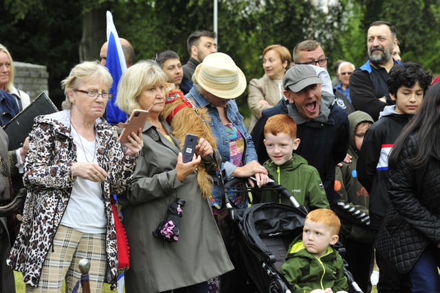 Preparing to grab a photograph from Saturday's event as the crowd in Callendar Park awaits the parade