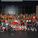 A packed stage of all those taking part in the Denny High School annual inter-house dance off.