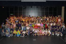 A packed stage of all those taking part in the Denny High School annual inter-house dance off.