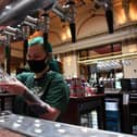 Hospitality businesses were among those hit by tougher restrictions after Christmas. Photo by ANDY BUCHANAN/AFP via Getty Images