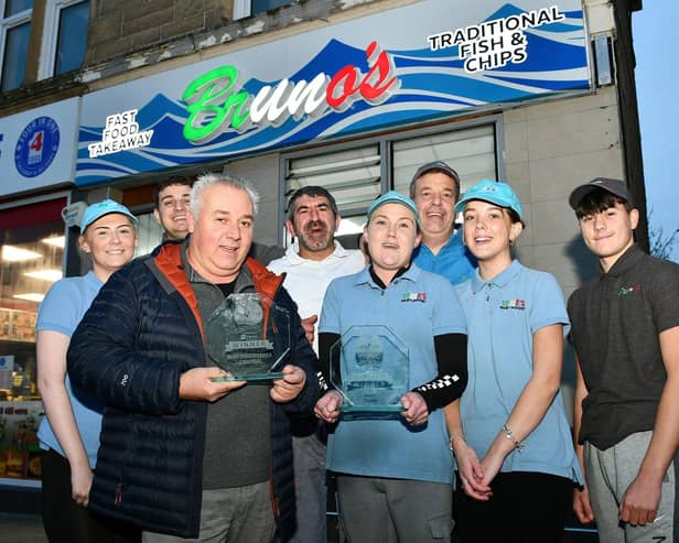 The delighted Bruno's team with their awards. Second from the left, Ernesto Di Carlo, owner, and front row, Bruno Minchella, founder and original owner. Pic: Michael Gillen